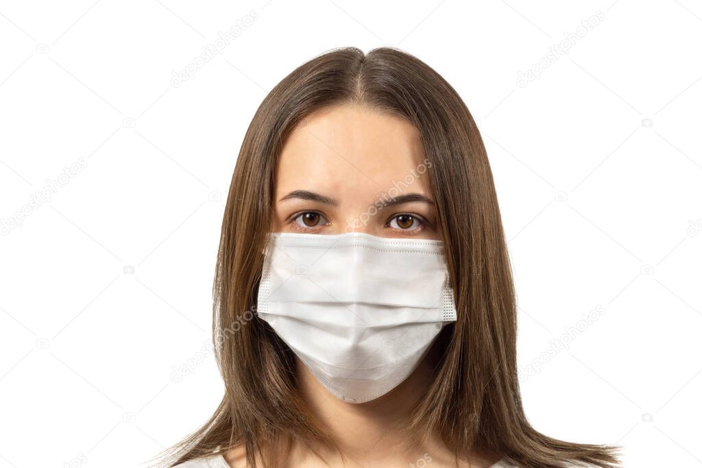 Girls in medical masks protecting against the epidemic of coronavirus isolated on white background