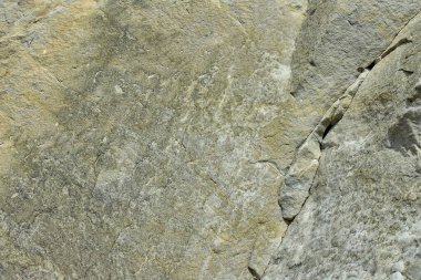 Taş duvarın dokusu. Eski kale taşından duvar dokusu. Arka plan ya da doku olarak taş duvar. Bir taş duvarın parçası, arkaplan veya doku için