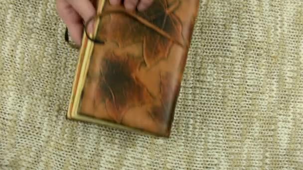 Girl Opens Vintage Notepad Puts Bright Surface Top View — Stock Video