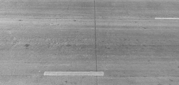 Grijze asfaltweg textuur — Stockfoto
