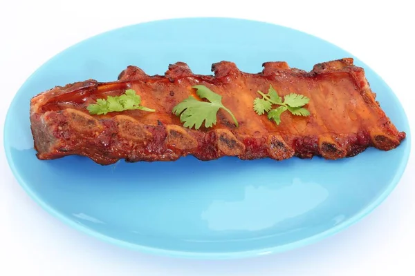 Grilled BBQ pork ribs on plate — Stock Photo, Image