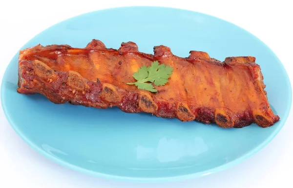 Grilled BBQ pork ribs on plate — Stock Photo, Image