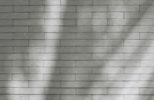 Padrão de parede de tijolo com sombras — Fotografia de Stock