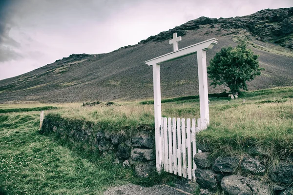 Abandoned Cemetery with mountains in the background