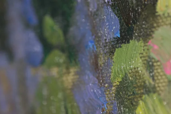 Micro photograph of paint on canvas