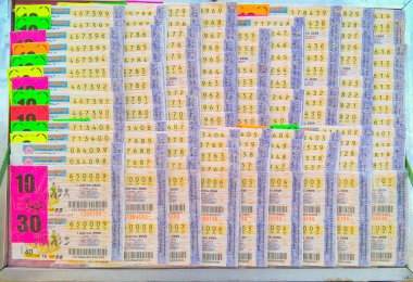 Bangkok , Thailand April, 1 2016 :Showing lottery ticket for sell at the market , Bangkok, Thailand. clipart
