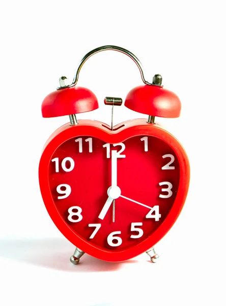 Red clock double bell mark at seven o'clock — Stock Photo, Image