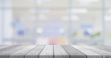 Koridor ve bokeh ışık arka plan bulanık görüntü altında yumuşak beyaz ahşap masa 