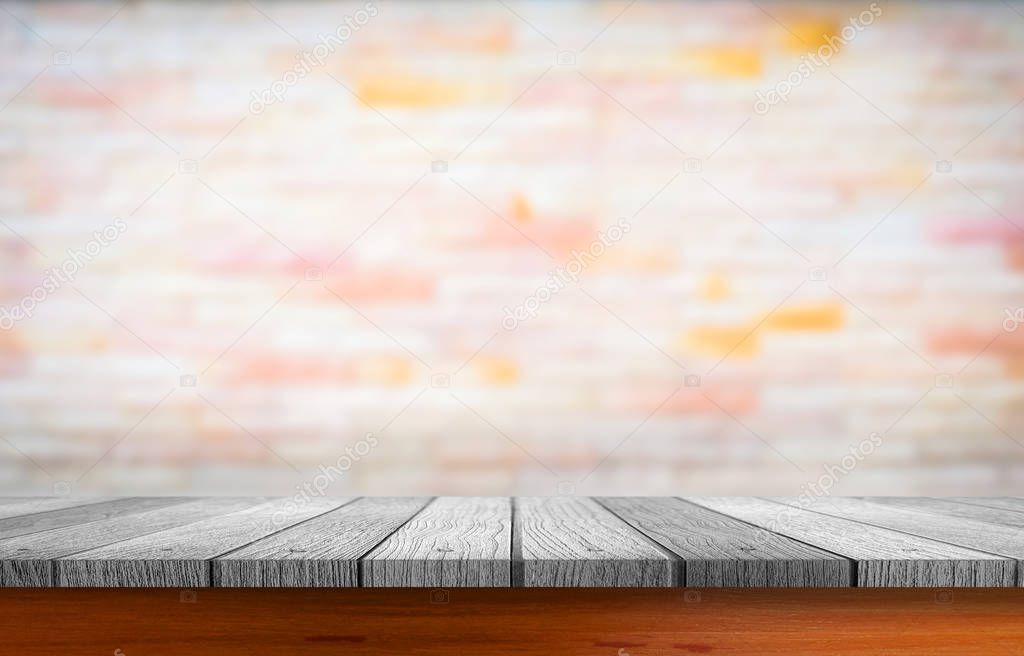 wooden table with blurred of cement wall 