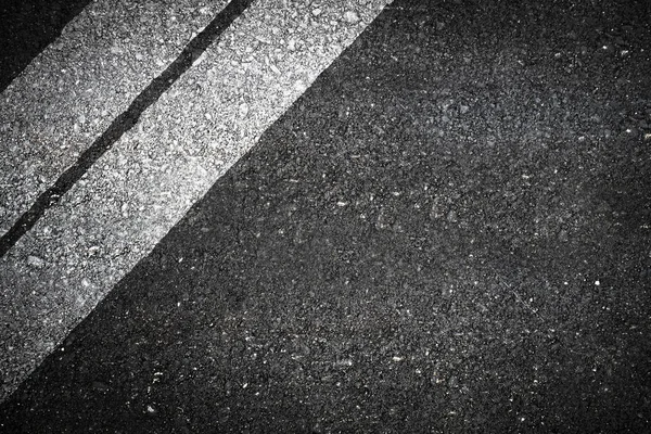 Fechar acima da vista superior velha da estrada do asfalto — Fotografia de Stock