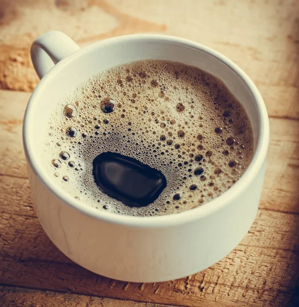 Taza de café poner en madera — Foto de Stock