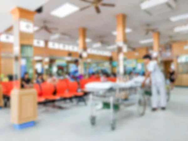 Blurred image of unidentified people waiting for doctor — Stock Photo, Image