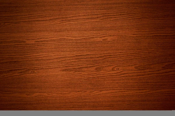 Закрыть коричневый деревянный стол — стоковое фото