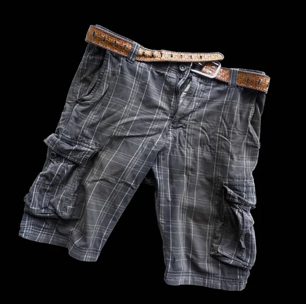 Viejo pantalón de óxido aislado sobre fondo negro — Foto de Stock