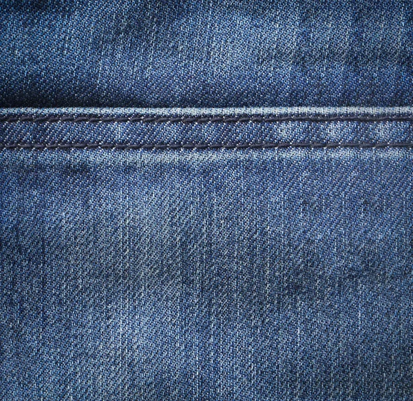 Pantalones vaqueros azules textura fondo —  Fotos de Stock