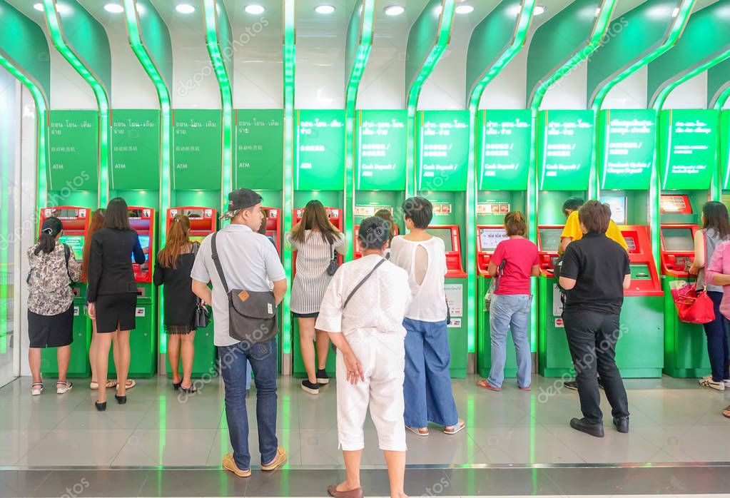 BANGKOK THAILAND - DECEMBER 4 : unidentified people using ATM machine at Central Ladplaw department store on December 4 2017 in Bangkok Thailand.