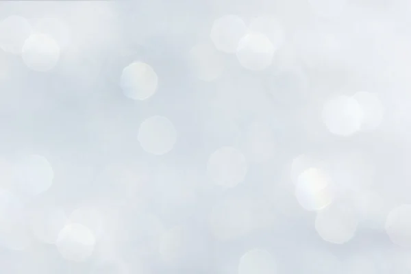 Bokeh weicher pastellweißer Hintergrund mit verschwommenem Regenbogenlicht. — Stockfoto