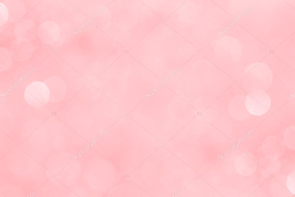 bokeh zachte pastel roze achtergrond met wazig gouden lichten