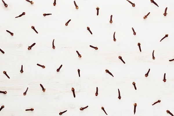 Cloves spice on white wood background. — Stock Photo, Image