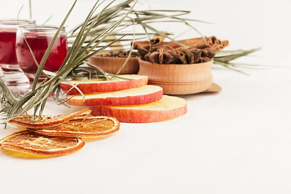 Christmas food background - mulled wine. Decorative decoration of  spices and drinks on white wooden table. — Stock Photo, Image