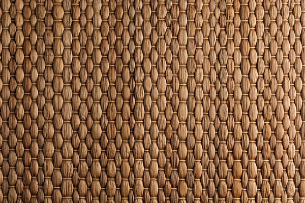 Alfombra marrón tejida de bambú fondo hecho a mano . —  Fotos de Stock