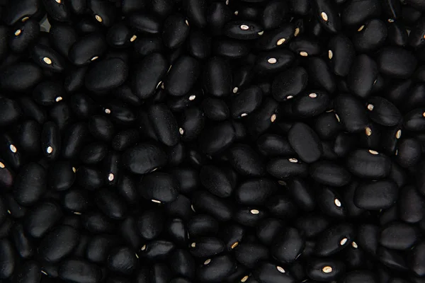 Frijoles negros primer plano vista superior fondo . — Foto de Stock
