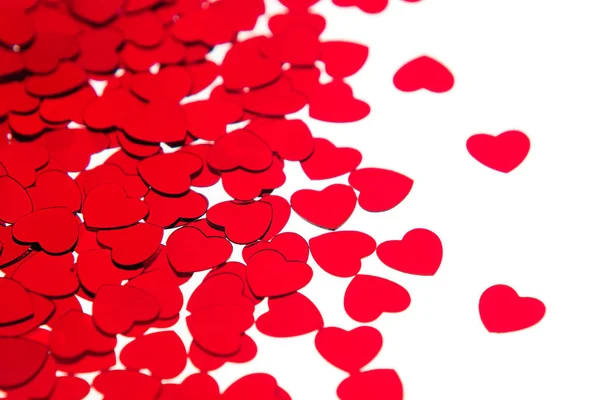 Valentines day border of red hearts confetti with copy space on white background. — Stock Photo, Image