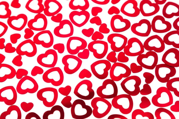 Valentine's day  decorative pattern red hearts confetti isolated on white background. — Stock Photo, Image