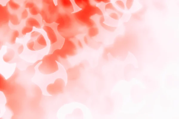 Valentinstag abstrakten Hintergrund der weichen roten, weißen Bokeh verschwimmen Herzen. — Stockfoto
