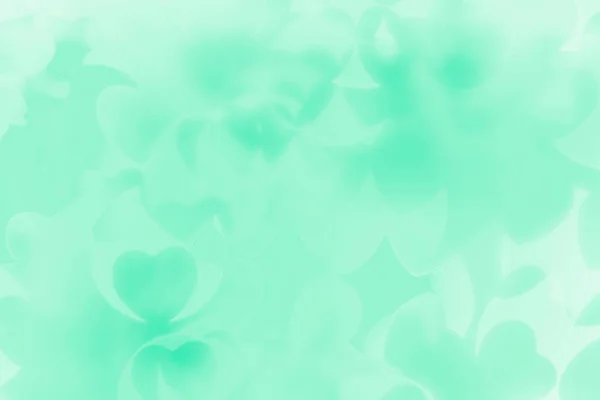 Día de San Valentín fondo abstracto de suave menta verde bokeh desenfoque corazones . — Foto de Stock