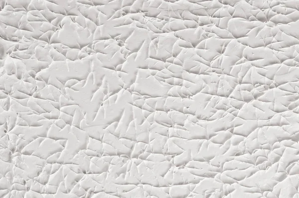 Tekstur plester abstrak dekoratif putih dengan retak, percikan, jejak kaki . — Stok Foto