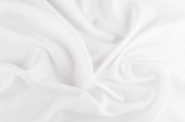 Witte gladde luxe zijden abstracte textuur met vloeibare golven. — Stockfoto
