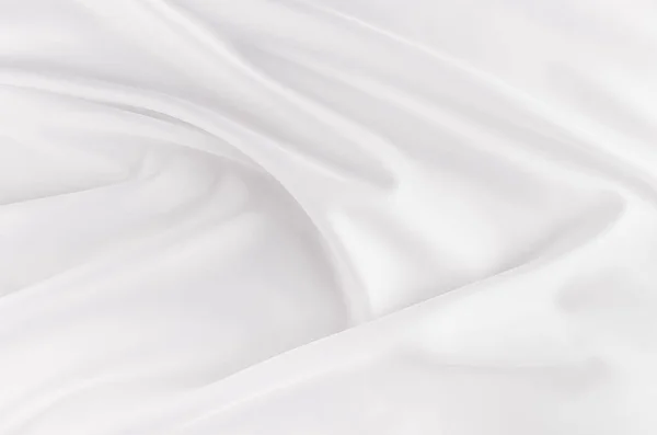 Witte gladde elegante zijde of Satijn stof textuur met vloeibare Golf. — Stockfoto