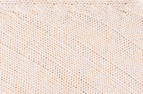 Beige zachte gebreide stof textuur met stroken wale. — Stockfoto