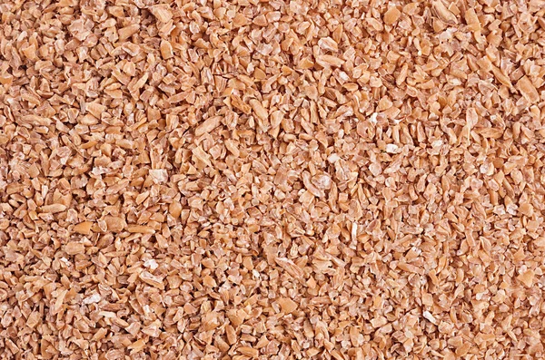 Weizen Grütze Textur Hintergrund. Ansicht von oben, Nahaufnahme. — Stockfoto