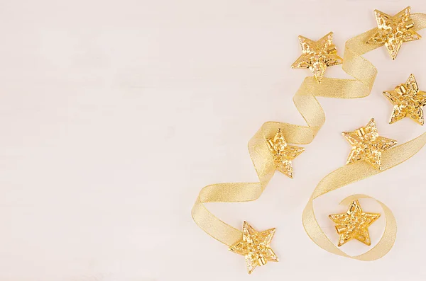 New Year Decorations Gold Stars Curl Ribbon Soft White Wooden — Stock Photo, Image