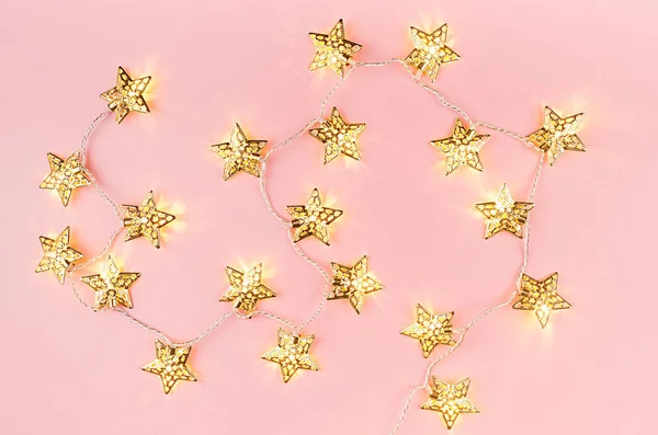 Festive Bright Background Gold Star Lights Garland Pastel Pink Color — Stock Photo, Image