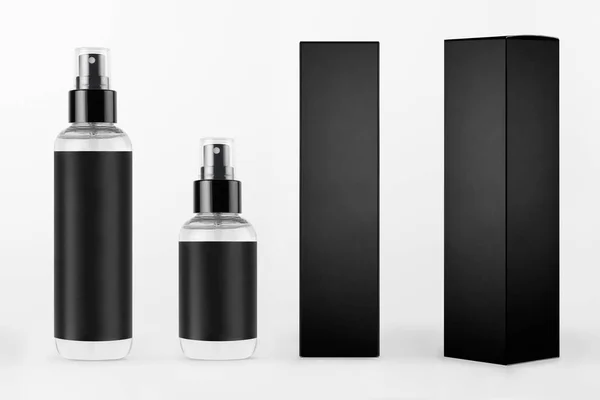 化妆品包装设计模型 不同的透明药瓶 黑色标签 白色背景上不同侧面的黑色纸盒 — 图库照片