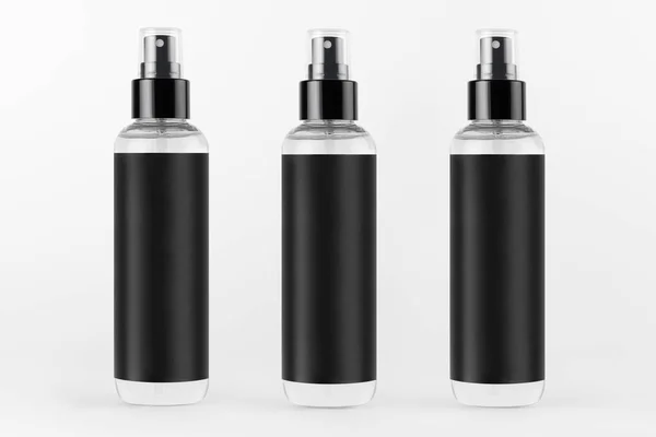 用于化妆品系列的高透明喷雾器瓶 白色底座上连续印有黑色标签 可用于设计 — 图库照片