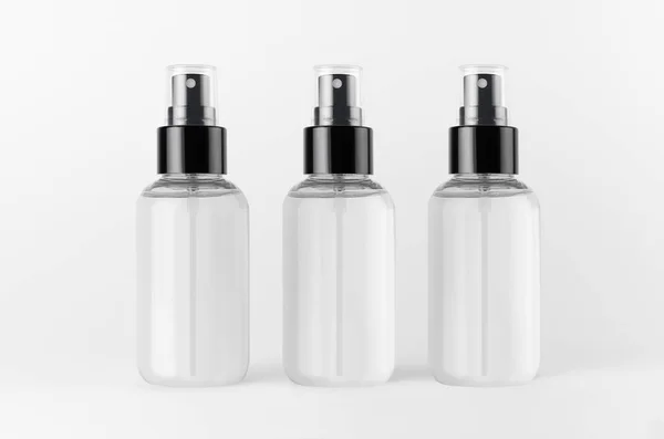 Tres Botellas Spray Para Productos Cosméticos Con Líquido Transparente Sobre — Foto de Stock