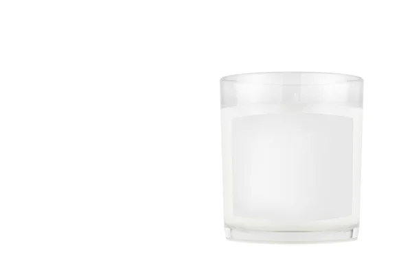 プレゼンテーション デザインパッキングのブランドアイデンティティのための独立した モックアップ上の白い空白のラベルを持つ透明なガラスの白いキャンドル — ストック写真