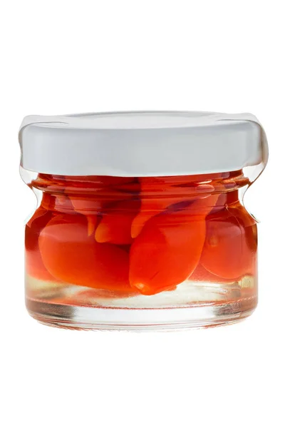 Süße Chili im Glas auf weißem Hintergrund — Stockfoto