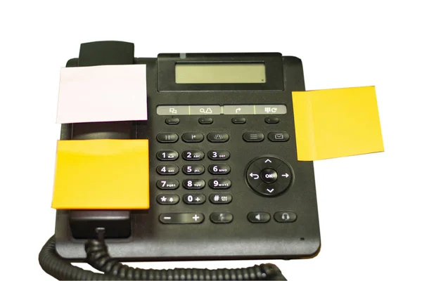 Telefone preto moderno escritório com adesivos isolados no branco Backgr — Fotografia de Stock