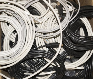 background of black and white network wires with rj45 connector