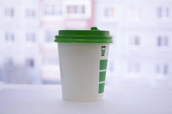 Cup of coffee on window still — Stockfoto