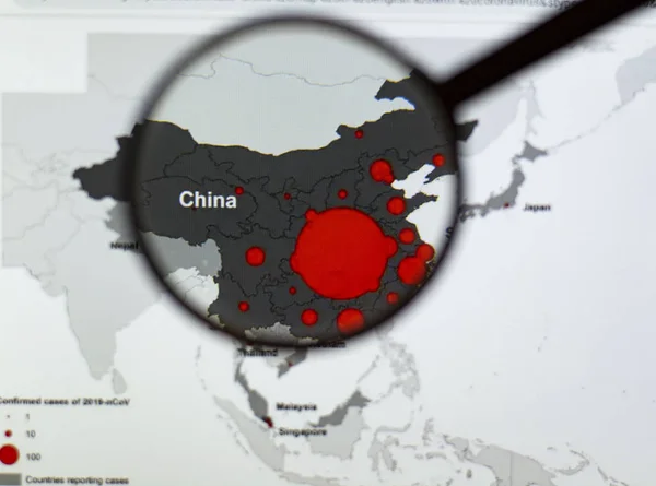 Using a magnifying glass, view of the foci of the coronovirus in China