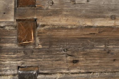 Çok eski, koyu renk ahşap desen ve dokunun yakın çekimi. mesaj için yer. Hikayenin düzeni