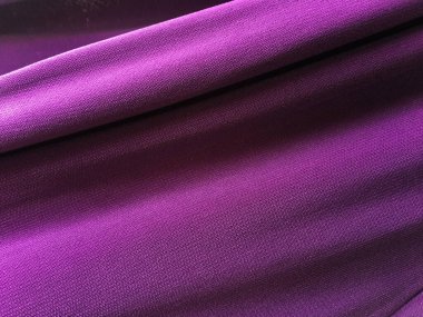 Tasarım için açık mor kumaş dokusu arka planı. metin için boşluk kopyala, üst görünüm.