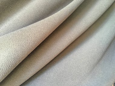 Tasarım için beyaz ipek ya da saten kumaş arkaplan. metin için boşluk kopyala, üst görünüm.