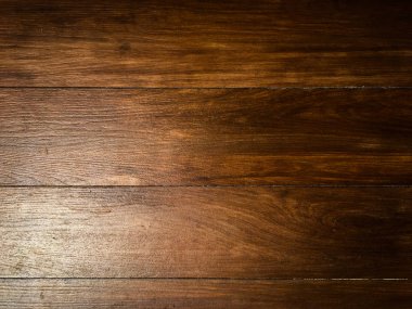 Tahta doku doğal arkaplan olarak kullanılıyor ve tasarım için kopya alanı kullanılıyor.